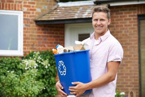 Inspector providing a free waste removal quote at a small retail unit